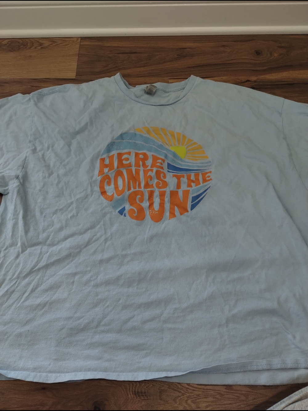 Gildan Light Blue Short Sleeve Tee with Orange Sun Graphic